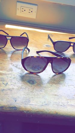 Designer sunglasses (Gucci, Dior)