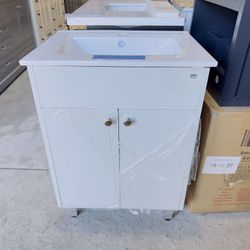 24 in. W x 18 in. D x 31.5 in. H Single Sink Freestanding Bathroom Vanity in White with White Top $249 