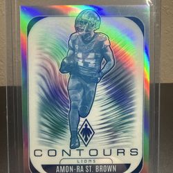 2025 Panini Phoenix - Contours Amon-Ra St. Brown #11