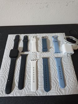 Apple Watch SE with Multiple Bands and Charger