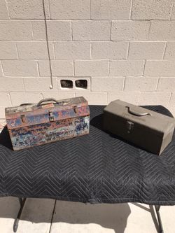 Two old metal tool boxes