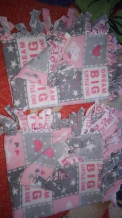 2 small puppy tie blankets