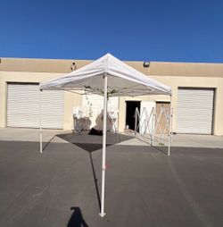 10 foot white commercial grade Pop-up canopy for the Beach, farmers market, campaign, barbecue, etc.