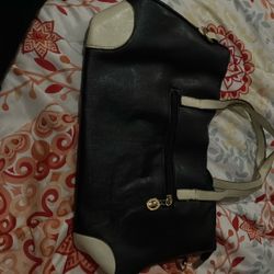 Black Leather Bag With Cream Exterior