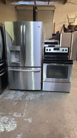 Refrigerator ge french door,  Stove electric and microwave in Stainless steel combo Delevery
