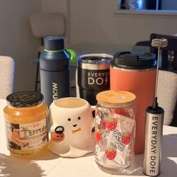 various items bundle mug tumbler milk frother ginger tea