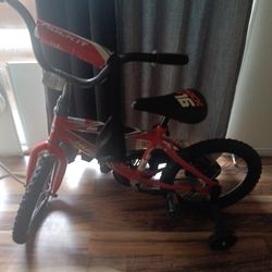 Bike with training wheels.