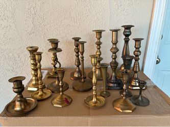 Antique brass candle holders (17)