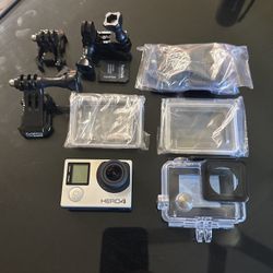 GoPro Hero 4 With Waterproof Cases And Mounts