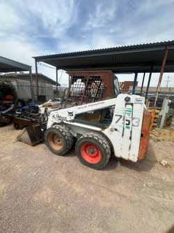 Bobcat 753 skid steer with backhoe attachment