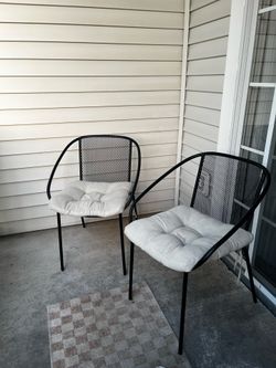 Two deck chairs & cushions