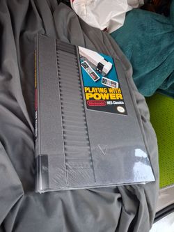 Nes Nintendo video game book playing with power