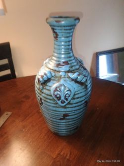 Turquoise w/brown vase . Ceramic 15"tall x 7"wide. Perfect condition