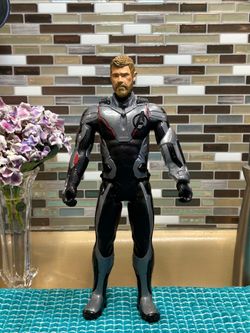 Hasbro Marvel Avengers: Endgame Titan Hero Series 12-inch Thor action figure. .Suit: Features Thor in his "Avengers: Endgame" suit. NOTE: Compatibilit