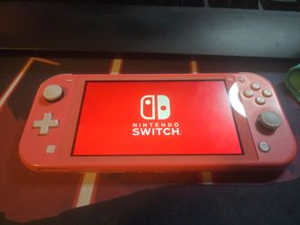 Nintendo switch lite coral pink with cover