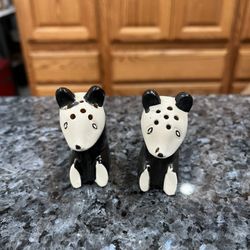 Vintage Panda Bear pair of salt and pepper shakers.  Size approximately 2 1/2 inches tall.  The bottom has “Japan” stamped on the bottom.  Preowned mi