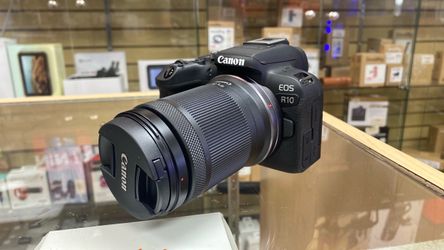 Canon R10 with 18-150mm.   Open box