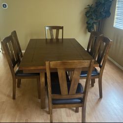 Brown Table With Six Chairs 
