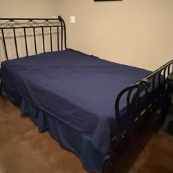Full sized metal curved bed frame (in Tempe)