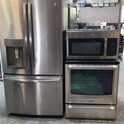 Refrigerator Ge French Door,  Stove Electric And Microwave In Stainless Steel Combo Delevery 
