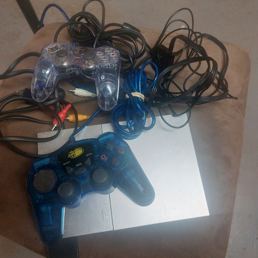 Ps2 Slim Silver With 3 Games And Two Controllers 100 Dollars Firm