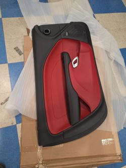 Door trim panel, driver side