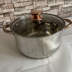 A multi-functional soup pot made of thick stainless steel,  dimensions (depth = 5.5" diameter = 9.5"),  used put in very good condition.
