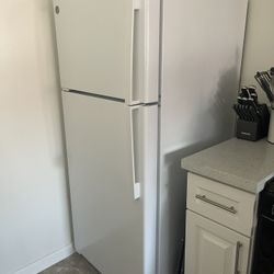 Refrigerator: GE 16.6 cu. ft. Top Freezer (White)