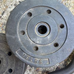 ez curl bar with two ten pound plates and two fifteen