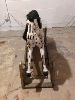 Antique rockong horse approximately 100 years old.