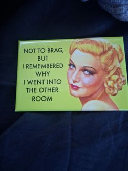 3 Madeleine Carroll magnets and 1 cat
