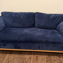 Blue Velvet Pull Out Sofa With Wooden Base