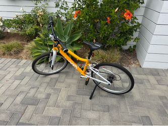 Yellow Woom size 4 Kids Bike — Like New Condition — $400