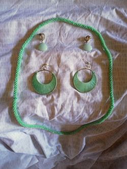 Women's jade necklace and earrings set.