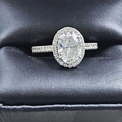 Oval Cut Diamond Halo Engagement Ring in 18 Kt White Gold
