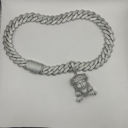iced out cuban link chain and pendant
