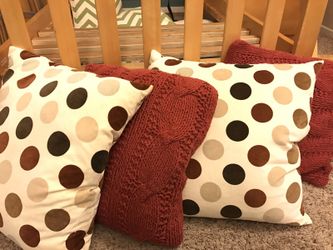 Red brown and white pillows