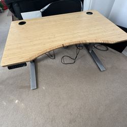 Herman Miller Jarvis Bamboo Electric Adjustable Sit to Stand Desk. 