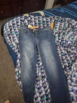Brand new angel jeans 10/30