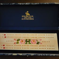 IVORY CRIBBAGE  BOARD AND CASE.