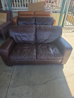 Dark Brown Leather Loveseats, $75 Each