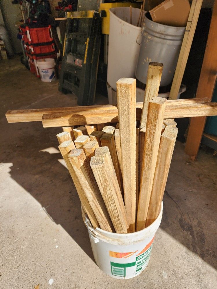2x2 pressure treated  pickets $1  aprox 40