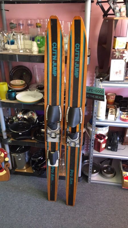 Solved An 79.5 kg skier is gliding on her waxed wood skis