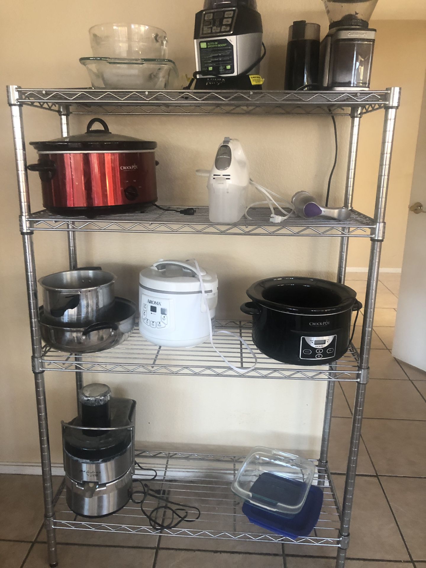 Kitchen appliances and metal kitchen rack