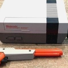 Regular Nintendo W. Remotes And Duck Hunting Gun