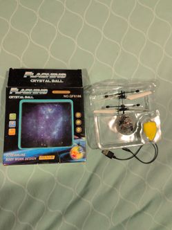 Drone-like flashing ball toy