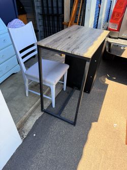Desk: 36" wide, 36" high, 19" deep chair included