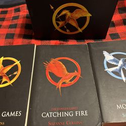 •	Twilight Saga (5 movies on DVD) 	•	The Hunger Games Trilogy (3 books in English, box set)