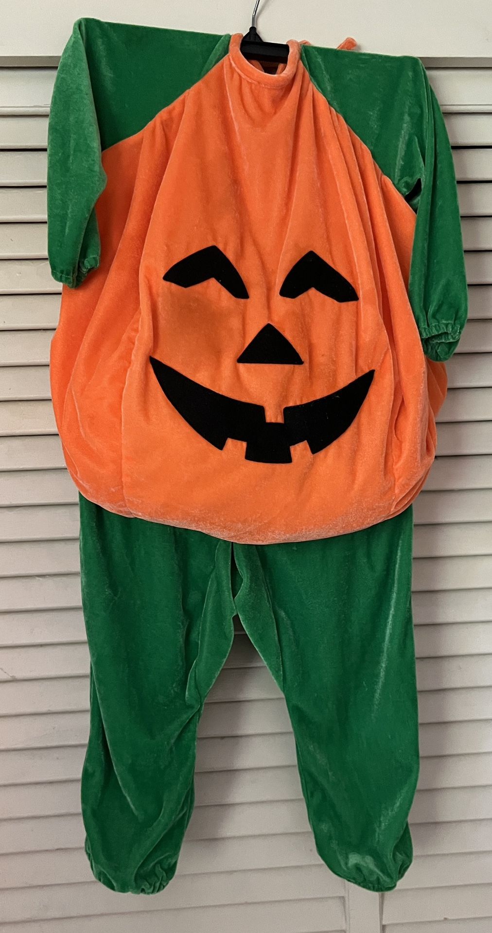 Pumpkin Halloween costume, girls or boys ages three and up. Costume and hat.