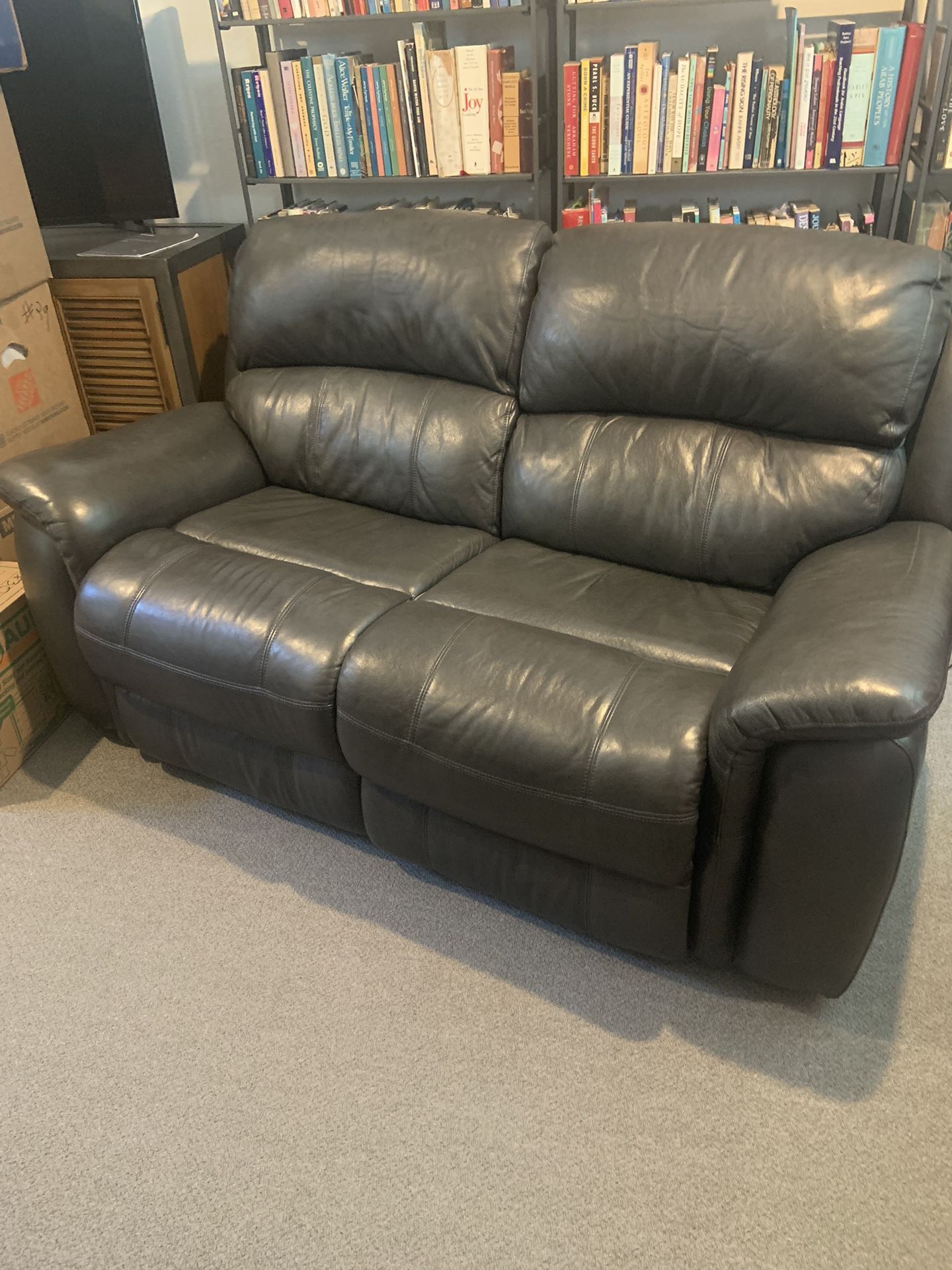 Charcoal Leather 2-seater reclining Couch.